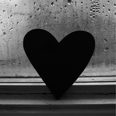black heart in rain