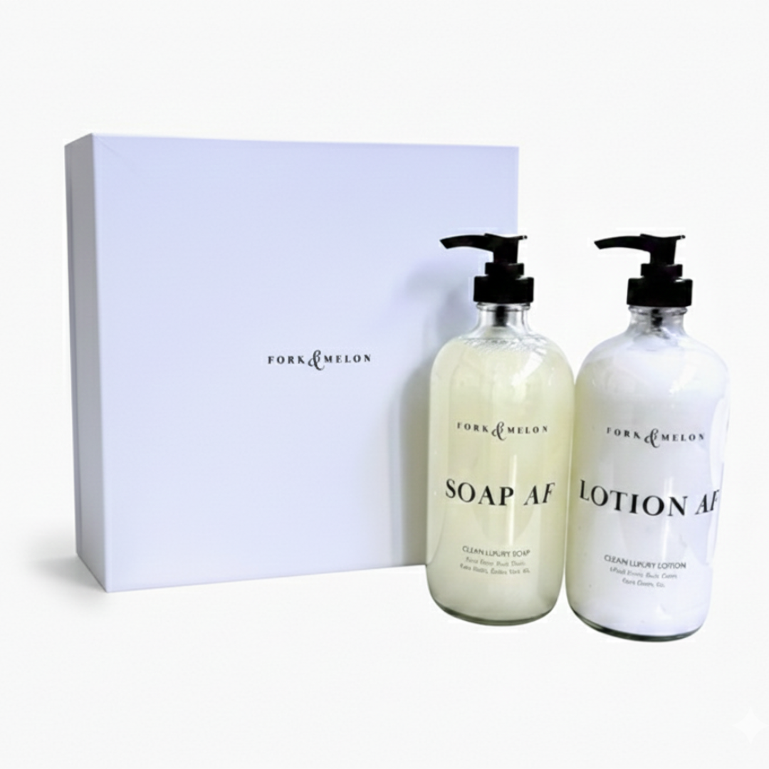 FORK & MELON SOAP AF and LOTION AF glass bottles with black pumps beside a white FORK & MELON gift box on a clean white background, styled for a minimal luxury presentation.