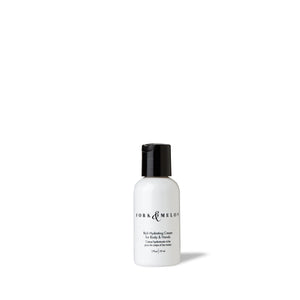 Travel-size black and white hand lotion / body lotion by FORK & MELON