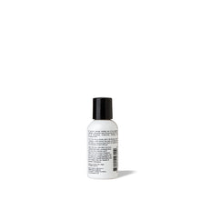 Load image into Gallery viewer, Back label of Travel-size, TSA-approved black and white hand soap and body wash by FORK &amp; MELON